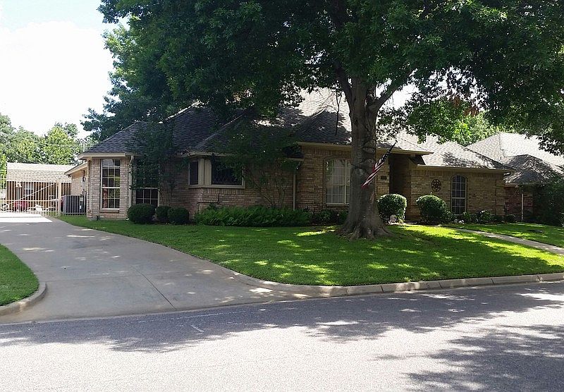 Long drivewy with security gate
						:
						Beautiful, mature trees...quiet neighborhood
