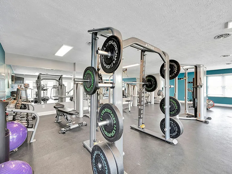 Fully Equipped Fitness Center with Workout Machines at The Commons Student Apartments in Oxford, OH