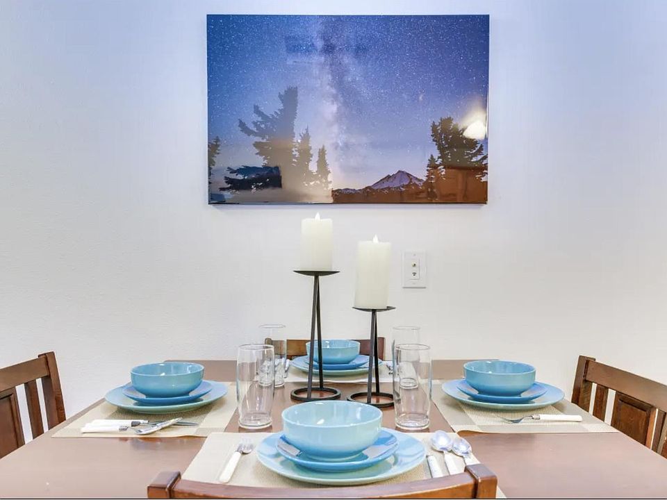 Dining Area (Hanging TV has replaced art)

Decor/sheets/furniture will differ from photos but will have either equal or greater quality