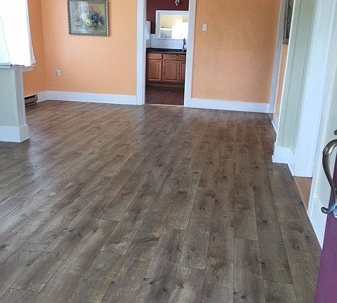 View from front door through dining room to kitchen.