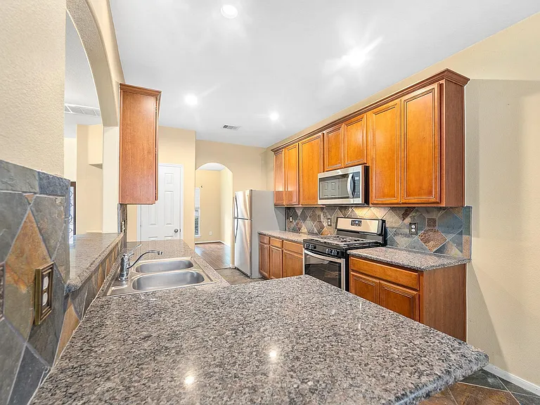 10003 Lynette Falls Dr — Photo 17