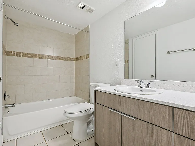 Bathroom with Large Vanity & Tub