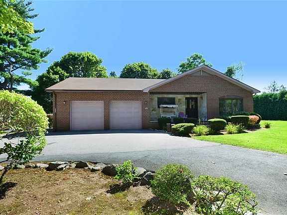 Exterior view of the home from the circular drive.