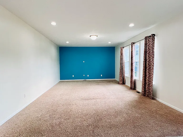 Large family room with accent wall