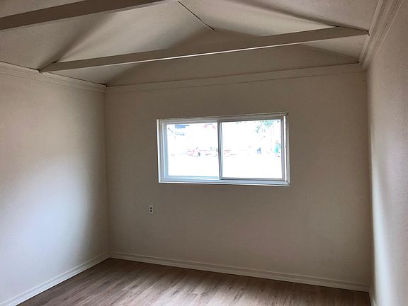 Master bedroom with view to back yard