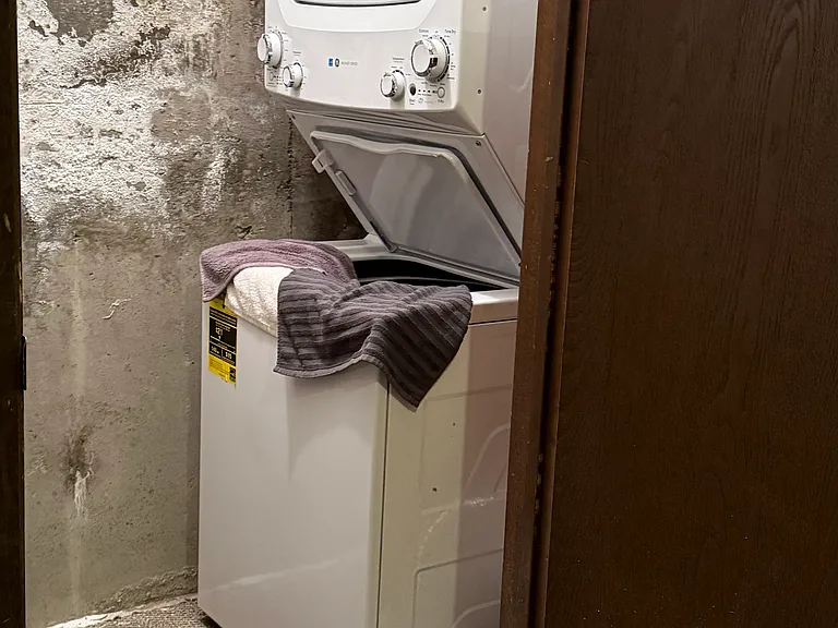 Private laundry in the garage closet