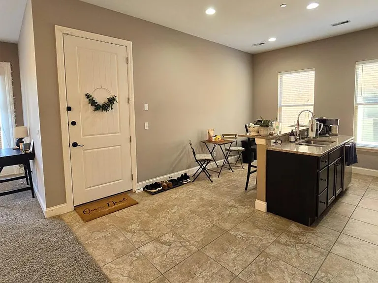 Unit entrance and kitchen
