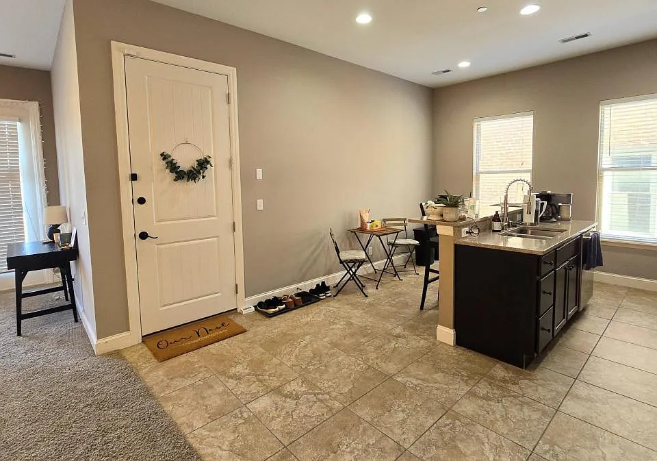 Unit entrance and kitchen