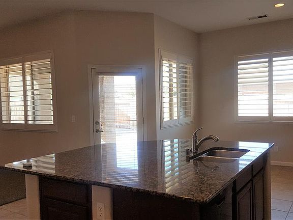 Kitchen with door to patio