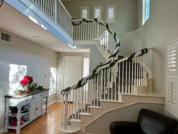 Entry way with elegant staircase