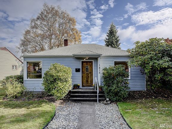 Welcoming sidewalk and front entry for your guests. Just a darling one level home!