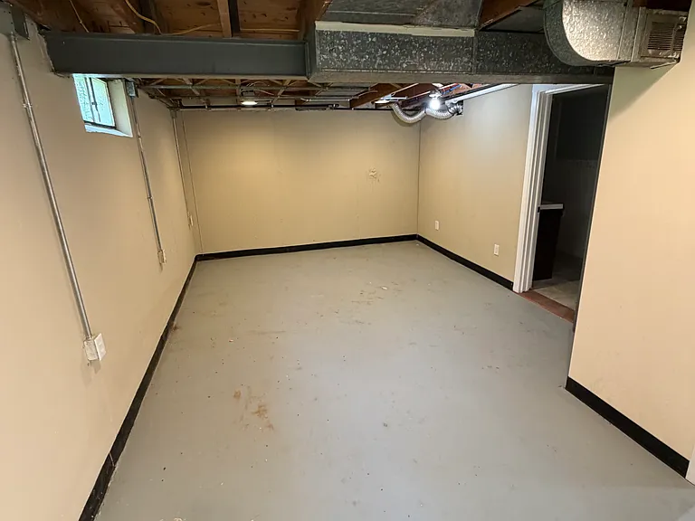 basement rear bonus room, full bath