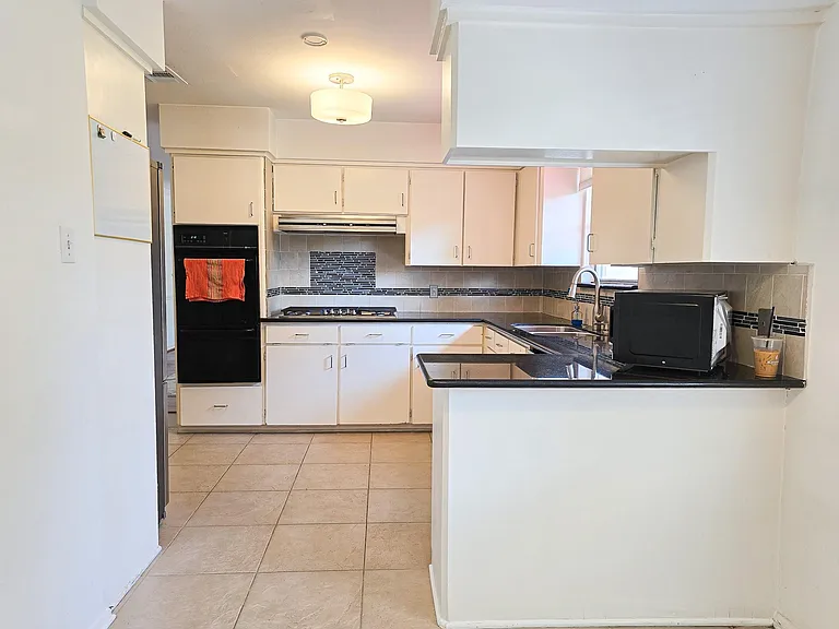 9507 Meadowbriar Ln — Photo 13