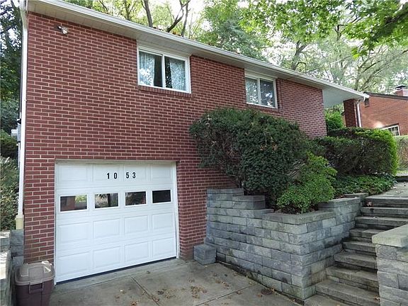 Solid brick home lovingly maintained. The auto garage door is unbelievably quiet!