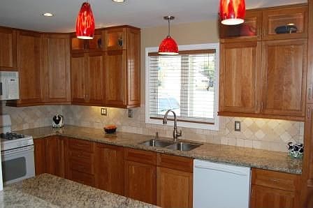 Granite, travertine, custom cabinets...