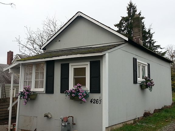 Cottage View from Alley and Parking