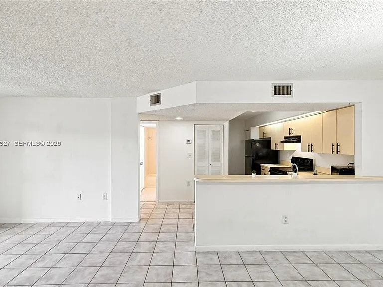 8660 SW 212th St #306 — Photo 1