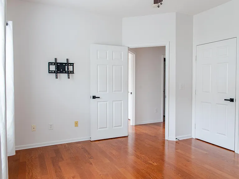 1 of 3 large bedrooms with hardwood floors