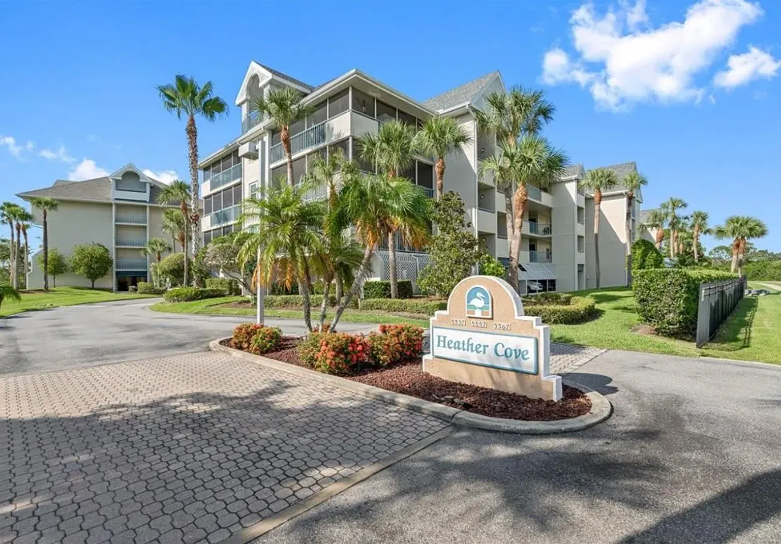 All Utilities Included! 2BR/2BA Condo with Water View, Screened Balcony & Heated Pool — Photo 1