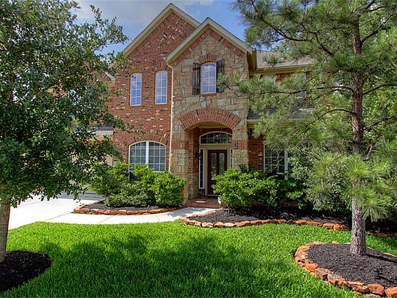 Welcome home to 3023 Rustic Gardens in the coveted neighborhood of Legends Ranch!