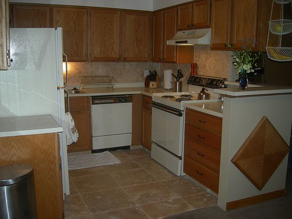 New Travertine tile in kitchen.