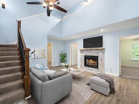 Staged family room, inviting as soon as you enter.