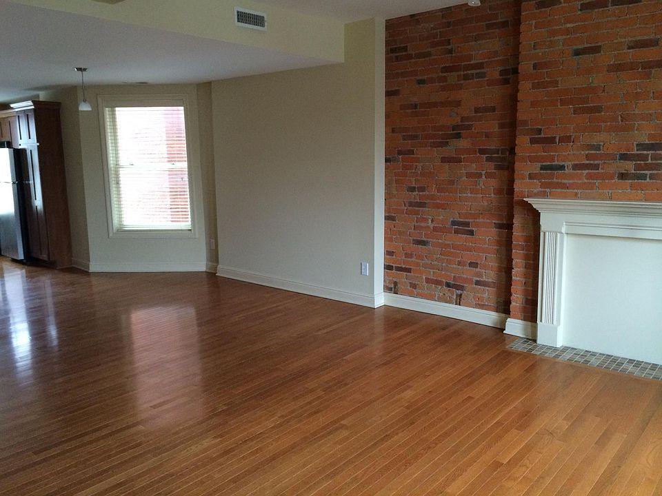 Living room with decorative fire place.
