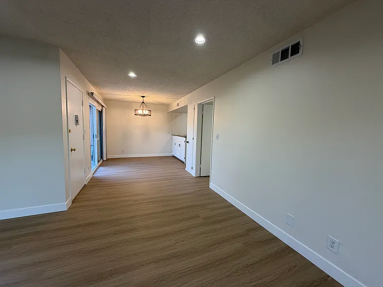 Living Room and Dining Area with Modern Style Wood Floors