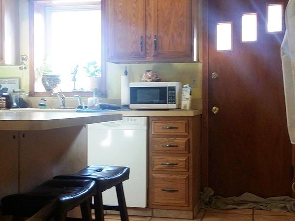 Sunny kitchen (2) w/ sleeping lab (not included). .lol