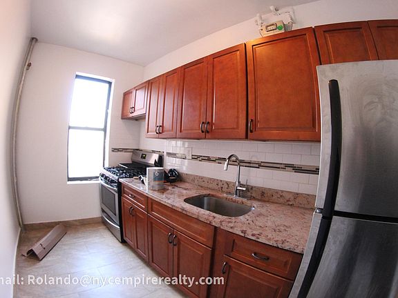 Stainless steel appliances and stone counters.