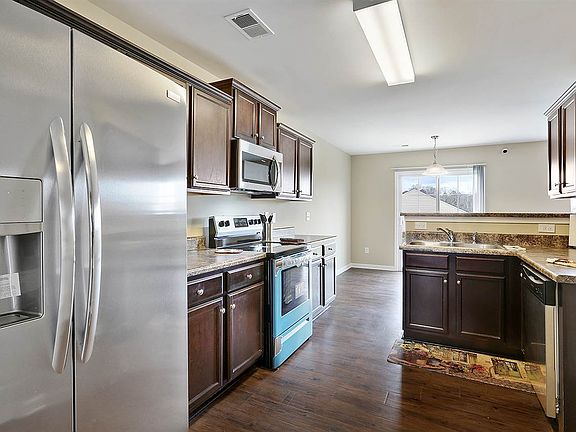 3rd image of 303 Brandon Oaks Dr