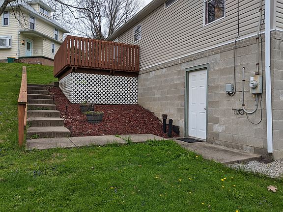 Exterior. Deck and steps to front door.