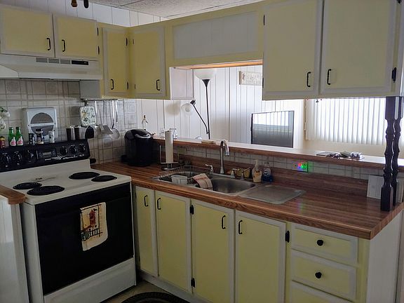 Kitchen opens to Living Room