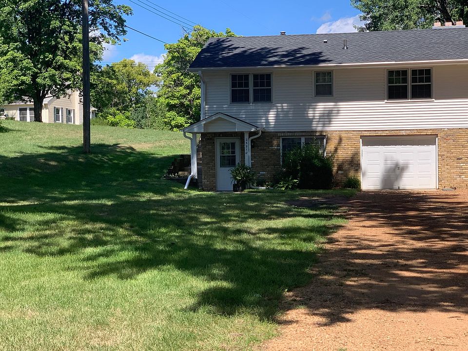 Left side unit with single car garage
