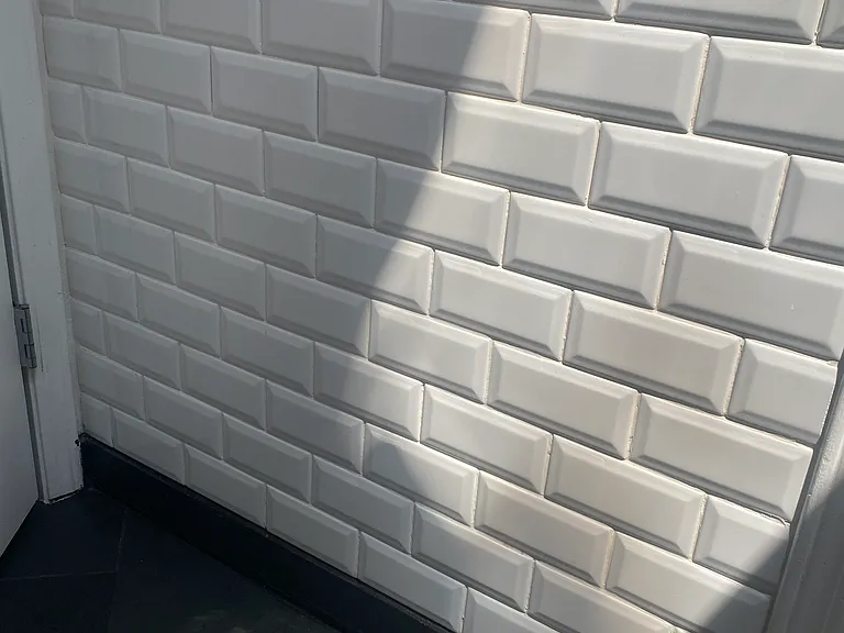Another lovely sunlight pic highlighting the custom tile and natural clefted slate flooring!
