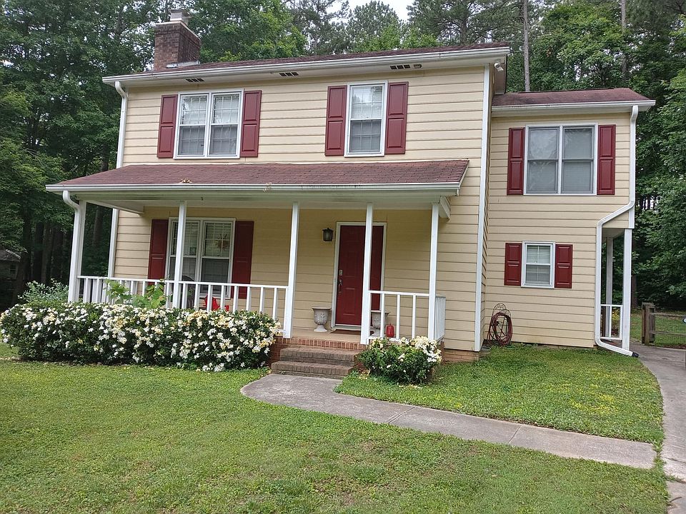 Enjoy the rocking chair front porch, surrounded by gardenias!