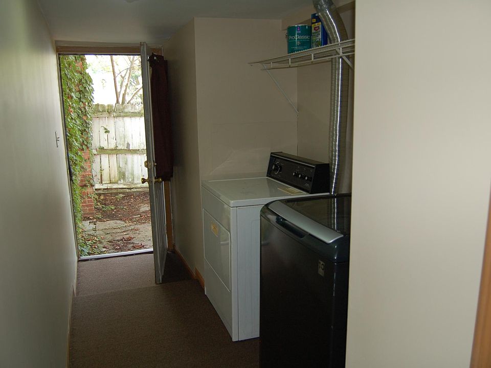 Laundry and door to private patio