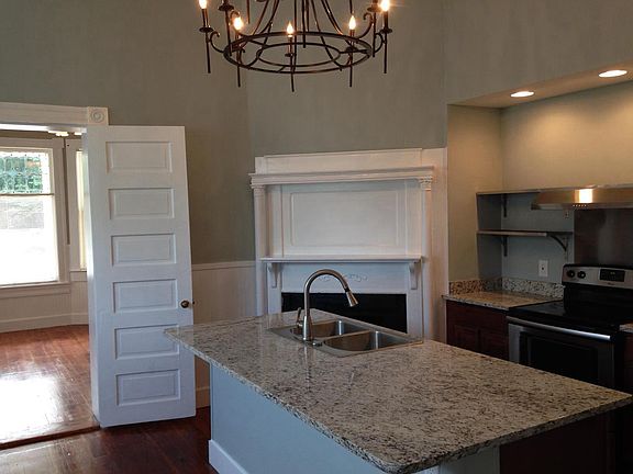 Kitchen opens to living room