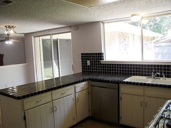 Large Picture Window Overlooks Backyard