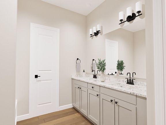 Master bathroom with a large vanity.