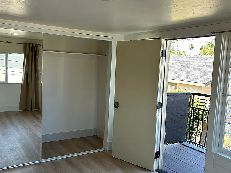 Third bedroom with balcony