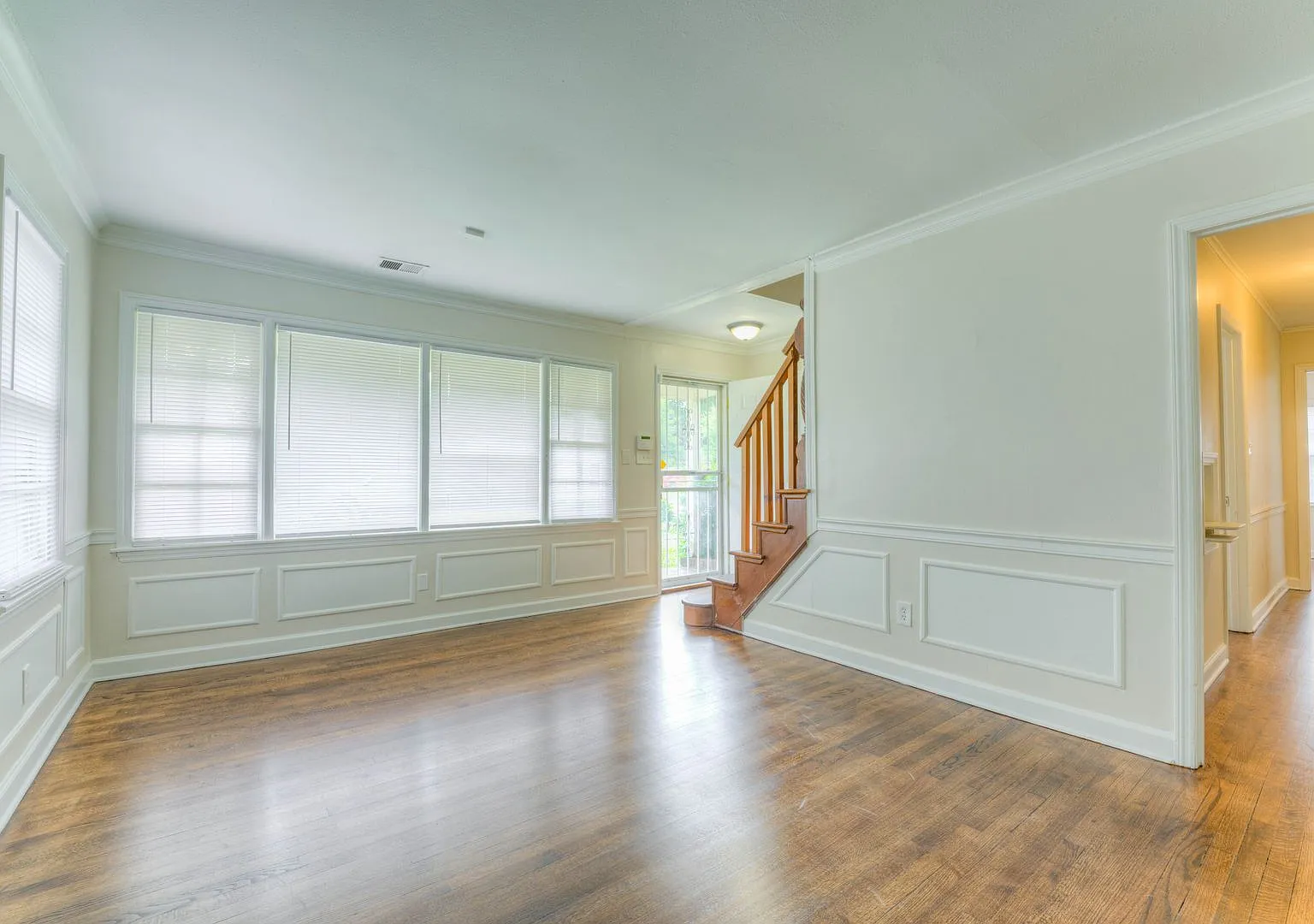 Large 5-Bedroom Home with Hardwood Floors & Fenced Yard — Photo 3