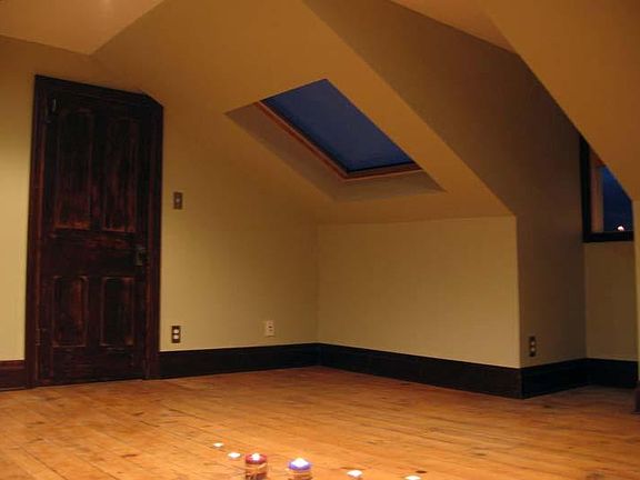 3rd floor bedroom with skylight