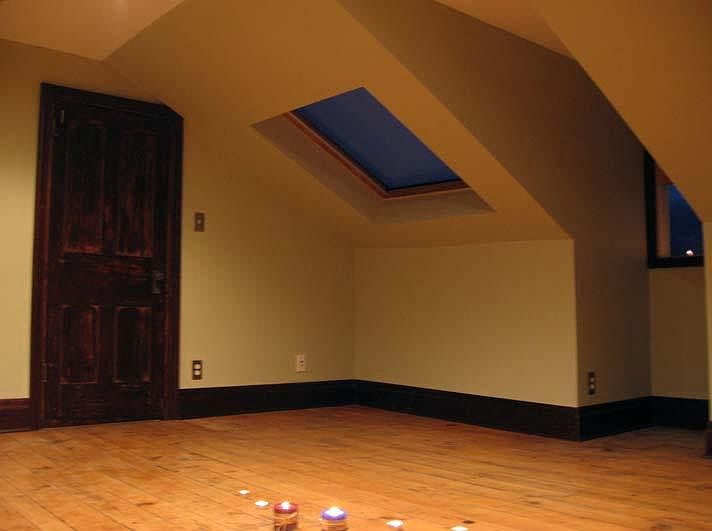 3rd floor bedroom with skylight