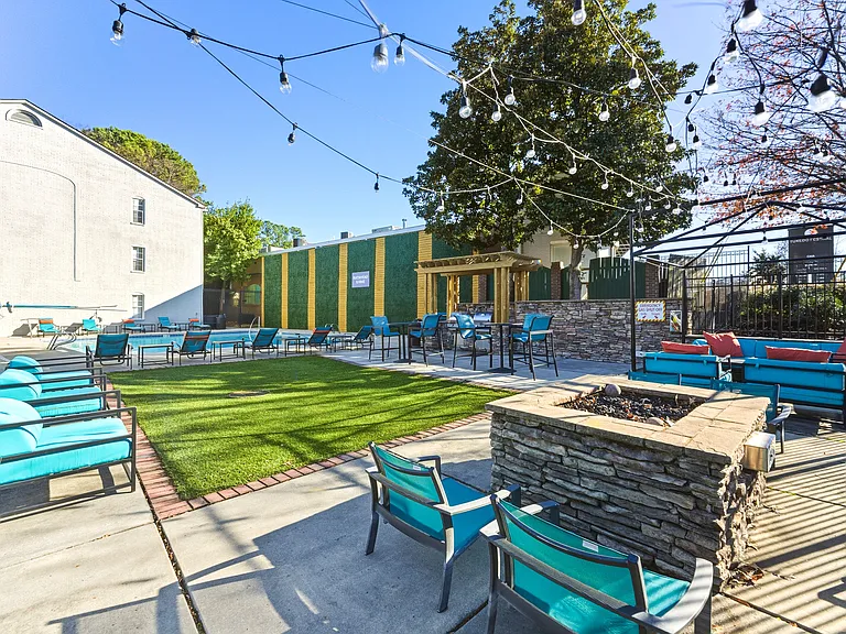 Spacious pool deck with lounge seating for sun-soaked afternoons