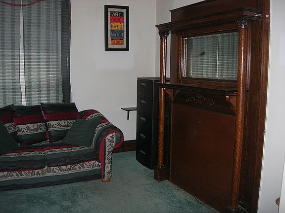 Living room mantle/decorative fireplace (couch is no longer there)