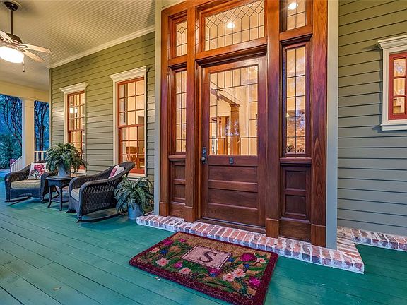 A step back in time, when things were constructed with beauty and pride by true craftsman. This gorgeous front door frame comes from the University of Louisiana in Lafayette. You will see this same quality and beauty throughout this home and property