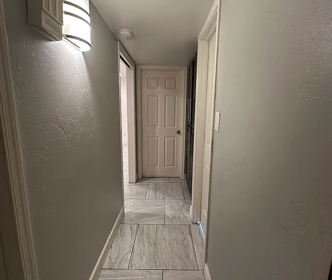Hallway leading to additional bedrooms