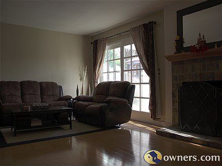 Living Room angle with Sliding Doors
