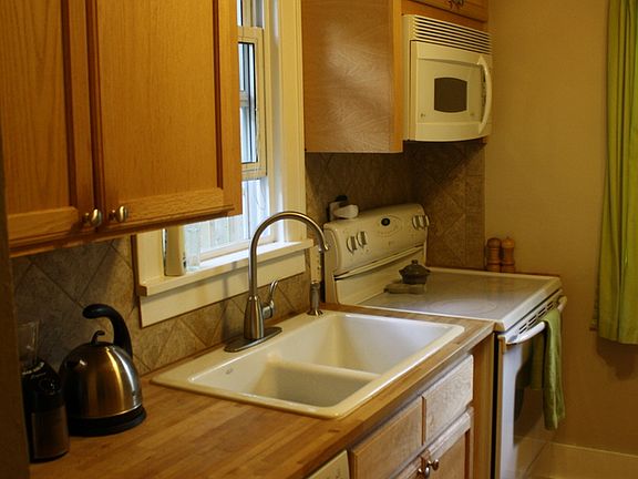 new sink/faucet, cabinets